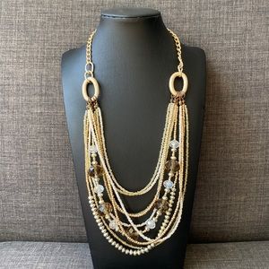 Gold colored necklace